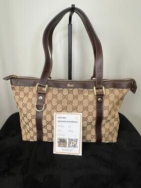 Gucci GG Canvas Brown Leather Zip Tote Shoulder Bag Authenticated Entrupy COA